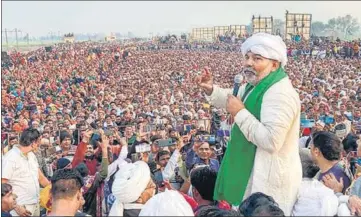  ?? PTI ?? Uttar Pradesh farm leader Rakesh Tikait addresses tens of thousands of farmers in Jind, Haryana, on Wednesday.