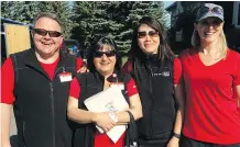  ??  ?? Picture perfect weather ensured the 24th Annual Calgary Co-op Charity Golf Classic held recently at Heritage Pointe Golf and Country Club was a great success. Pictured, from left, are invaluable volunteers Colin Donoghue, centre manager; Anna...