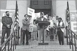  ?? [JULIE CARR SMYTH/THE ASSOCIATED PRESS] ?? Bill Lager, founder of ECOT, Ohio’s largest online charter school, speaks to hundreds of supporters at a May 9 rally at the Statehouse. The online charter school is in a legal dispute with the Ohio Department of Education over attendance- tracking...