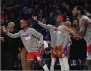  ?? PETER K. AFRIYIE — THE ASSOCIATED PRESS ?? 76ers bench players react during the second half against the Knicks in New York on Sunday.