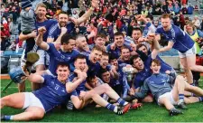  ?? PIARAS Ó MÍDHEACH/SPORTSFILE ?? Ardmore players celebrate their victory after extra-time in Croke Park