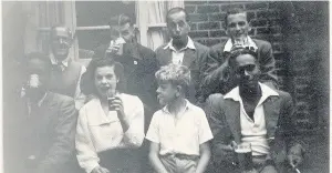  ??  ?? Pictured are: Back row from left to right: Jack Wootton (Dave’s father), Tony Simpson, Jack Marshall. Front row from left to right are: Mr Malum, Lil Kerry, Dav Wootton and Ken ___ out side of the Crown and Cushion pub in Ashby Square taken around 1949.