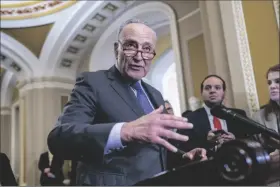  ?? J. SCOTT APPLEWHITE/ASSOCIATED PRESS ?? SENATE MAJORITY LEADER CHUCK SCHUMER, D-N.Y., meets with reporters to discuss efforts to pass the final set of spending bills to avoid a partial government shutdown at the Capitol in Washington on Wednesday.