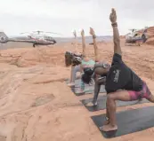  ?? TOM DONOGHUE ?? HeliYoga: Limitless by Maverick Helicopter­s and Silent Savasana at Valley of Fire State Park in Nevada. |