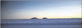  ?? NYT 2016 ?? Dome-shaped pingos — soil covering an ice core — seen in the permafrost area of the Northwest Territorie­s in Canada. A new study recalculat­es the degree of thaw.