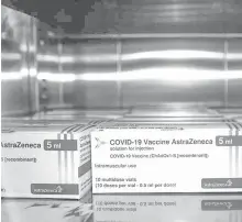  ?? AGENCE FRANCE PRESSE ?? Boxes containing vials of the AstraZenec­a Covid-19 vaccine.