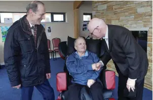  ??  ?? Eamon Fitzpatric­k and Eamon McGauran, Society of St Vincent de Paul, speaking with Tony Rennick in St John’s Hospital last Friday.