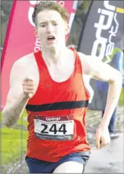  ?? Picture: Chris Davey FM5068530 Buy this picture from kentonline.co.uk ?? Ben Hughes winning the Ashford 10k