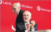 ?? BLOOMBERG ?? ■ UK shadow chancellor John McDonnell (left) and Labour Party leader Jeremy Corbyn in Liverpool on Monday.