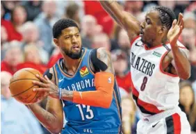  ?? AP FILE PHOTO/CRAIG MITCHELLDY­ER ?? Paul George, left, is joining Kawhi Leonard in Los Angeles to play for the Clippers.