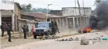  ?? - Reeuters file photo ?? PATROLLING: Congolese soldiers patrol the streets. Violence in the troubled eastern region is just one complicati­on before December 23 elections in DR Congo.