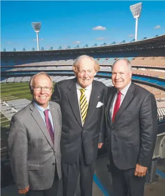  ??  ?? Commonweal­th Games bosses Peter Beattie and Mark Peters at the MCG yesterday with Ron Walker (centre), who was chairman of Melbourne 2006. Picture: MARK STEWART KATHLEEN SKENE