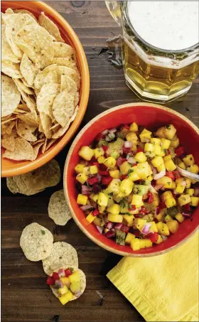  ?? CHEYENNE COHEN VIA THE ASSOCIATED PRESS ?? This image shows a dish of tropical fruit salsa.