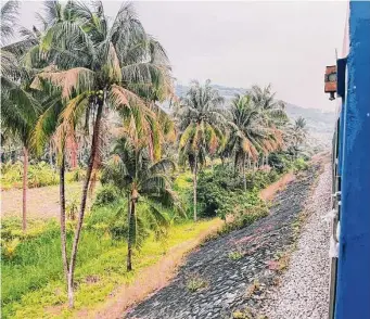  ?? Photos by Natalie Compton/Washington Post ?? The Reunificat­ion Express runs the length of Vietnam.