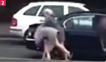  ??  ?? ...and throws her to the ground as their roadside fight halts traffic 2