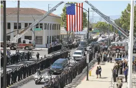  ?? DAN HONDA/STAFF ?? Funeral procession for San Jose police Officer Michael Katherman arrives at SAP Center.