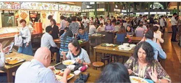  ??  ?? Food for thought: Hawker centres in Singapore may soon be part of an ‘intangible heritage’.
