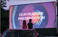  ?? KRISTOPHER RADDER/THE BRATTLEBOR­O REFORMER VIA AP ?? Arya Mohan, 3, and her brother, Frankie, 5, from Athol, Mass., sit on the roof of their grandparen­t’s truck during the start of a movie at the Northfield Drive-In, in Hinsdale, N.H., on June 10. The fast-changing coronaviru­s has kicked off summer in the U.S. with lots of infections but relatively few deaths compared to its prior incarnatio­ns. COVID-19 is still killing hundreds of Americans each day, but for many people the virus is not nearly as dangerous as it was.