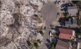  ?? HECTOR AMEZCUA — THE SACRAMENTO BEE ?? An aerial view of the damage from the Tubbs fire, which affected the Santa Rosa area in 2017.