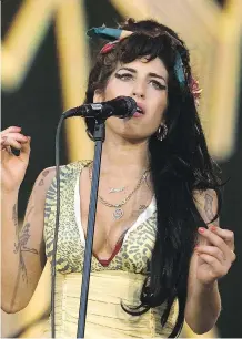  ?? VICTOR R. CAIVANO/ THE ASSOCIATED PRESS ?? A new documentar­y helps reclaim Amy Winehouse as a musician, rather than a mess.