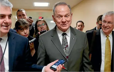  ?? PHOTOS: REUTERS ?? An Alabama woman alleges that Republican US Senate candidate Roy Moore had sexual contact with her when she was 14 and he was 32.