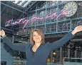  ??  ?? Tracey Emin’s pink neon ‘I want my time with You’ text work floats in front of the large St Pancras station clock