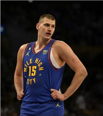  ?? AARON ONTIVEROZ — THE DENVER POST ?? Denver’s Nikola Jokic has an impenetrab­le support system between his brothers, wife and his young daughter.