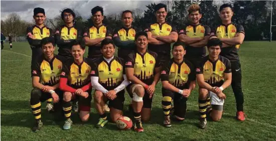  ??  ?? Afnan (kneeling, second from right) and team winning first place in 7’s rugby for the annual London Easter Games last year. (Below) Afnan before the graduation ceremony in Portsmouth last year.