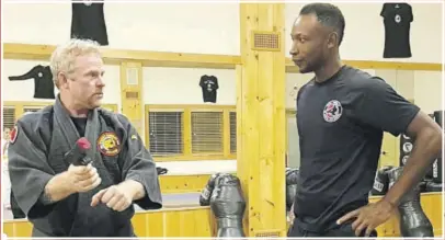  ??  ?? In these file photos self-defence instructor Patroy Jones (right) is being trained in Jujitsu Martial Arts by Professor Mark Tuthill at the Martial Arts Center in New York.