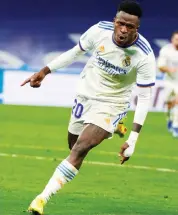  ?? — AP ?? Real Madrid’s Vinicius Junior celebrates after scoring against Sevilla during their Spanish league match at the Bernabeu Stadium in Madrid on Sunday.