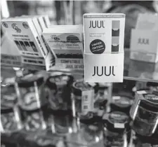  ?? Joshua Bright/New York Times ?? Juul Labs has tentativel­y agreed to pay $438.5 million to settle an investigat­ion by nearly three dozen states that focused on the company’s sales and marketing practices that they claim fueled the teenage vaping crisis.