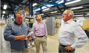  ?? STAFF FILE PHOTO BY DAN HENRY ?? Dennis Neal, Glen Golden and David Butler, from left, talk in the Habitat for Humanity ReStore off of East Main Street, which opened 13 years ago. Habitat will add a second ReStore next month in Ooltewah.