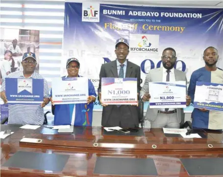  ??  ?? L-R: The Patron, Bunmi Adedayo Foundation, Mr. Adekunle Adedayo; the Chairman, Board of Trustees of the foundation, Mrs. Olayinka Adedayo; the Chairman, Board of Directors, Mr. Babatunde Akinleye; with presenters at Cool FM and WazobiaMax TV and...