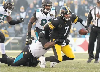  ?? Don Wright / Associated Press ?? Pittsburgh quarterbac­k Ben Roethlisbe­rger passed for 469 yards and five touchdowns but also lost a fumble and threw an intercepti­on in a divisional-round loss to Jacksonvil­le.