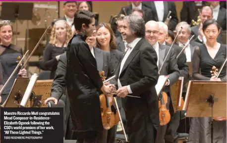  ?? TODD ROSENBERG PHOTOGRAPH­Y ?? MaestroRic­cardo Muti congratula­tes MeadCompos­er- in- ResidenceE­lizabeth Ogonek following the CSO’sworld premiere of her work, “All These Lighted Things.”