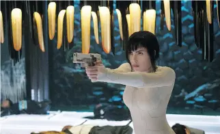  ?? PARAMOUNT PICTURES ?? Scarlett Johansson faced controvers­y for playing a character based on Japanese manga in the 2017 movie Ghost in the Shell.