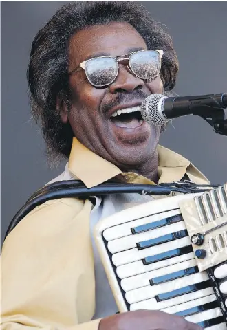  ?? THE ASSOCIATED PRESS/FILES ?? Buckwheat Zydeco performs at the New Orleans Jazz and Heritage Festival in 2011. Stanley (Buckwheat) Dural Jr., who introduced zydeco music to the world, died at 68.