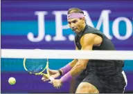  ?? Eduardo Munoz Alvarez / Associated Press ?? Rafael Nadal returns a shot to Matteo Berrettini during the singles semifinals of the U.S. Open on Sept. 6 in New York.