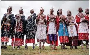  ?? ?? Maasai women spectators watch the Maasai Olympics.