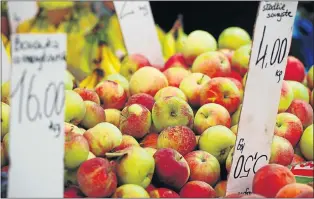  ?? Picture: REUTERS ?? SURPLUS STOCK: Apples are pictured at a fruit and vegetables market in Warsaw in this August 13 file photo. As the EU’s second-biggest apple producer, Poland has some 700,000 tonnes of the fruit it usually sells to Russia but cannot, due to Moscow’s food embargo on many EU and US goods as part of tit-for-tat sanctions related to the Ukraine crisis. Many of the Polish apples will inevitably head for western Europe.