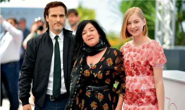  ??  ?? Joaquin Phoenix, British director Lynne Ramsay and Russian-US actress Ekaterina Samsonov seen at the premiere of You Were Never Really Here