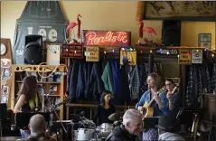  ?? COURTESY OF ALICE BOURGET ?? On weekends, the San Gregorio General Store is filled with music by local bands such as the Squirrels of Wisdom.