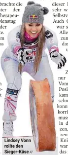  ??  ?? Lindsey Vonn rollte den Sieger-käse AP