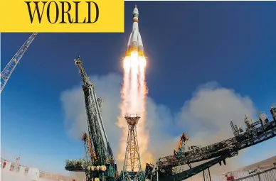  ?? RUSSIAN DEFENCE MINISTRY PRESS SERVICE PHOTO VIA AP ?? The Soyuz MS-10 carrying a new crew to the Internatio­nal Space Station blasts off in Kazakhstan on Thursday. The rocket made it about halfway to space before a breakdown forced the crew to make an emergency landing.