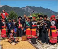  ??  ?? From left: Family photos by photograph­er Chen Lin of the Wa, Achang and Nu ethnic groups in Southwest China’s Yunnan province.