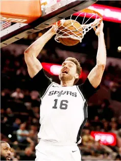  ??  ?? San Antonio Spurs centre Pau Gasol dunks the ball during the first half against the Oklahoma City Thunder at AT&amp;T Centre in this March 29 file photo. — USA TODAY Sports photo