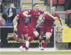  ?? ?? Greg Kiltie celebrates after scoring the only goal of the game on