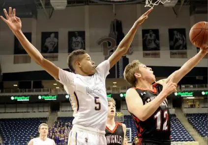  ?? Matt Freed/Post-Gazette ?? With a 7-foot-1 wingspan, Donovan Johnson was a key defender last season at Our Lady of the Sacred Heart.