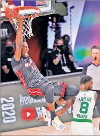  ?? AP ?? KICK IT UP A NOTCH: Bam Adebayo scored a season-high 32 points and grabbed 14 rebounds as the Heat closed out the Celtics in six games.