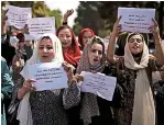  ??  ?? Afghan women march to demand their rights under the Taliban rule during a demonstrat­ion yesterday